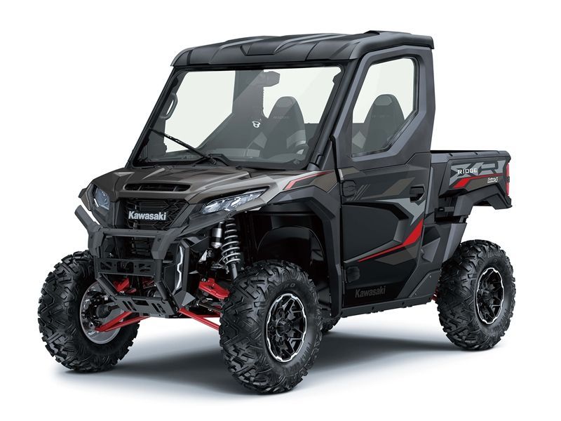 Black Kawasaki Teryx KRX 4 side-by-side UTV with cab, on white background.