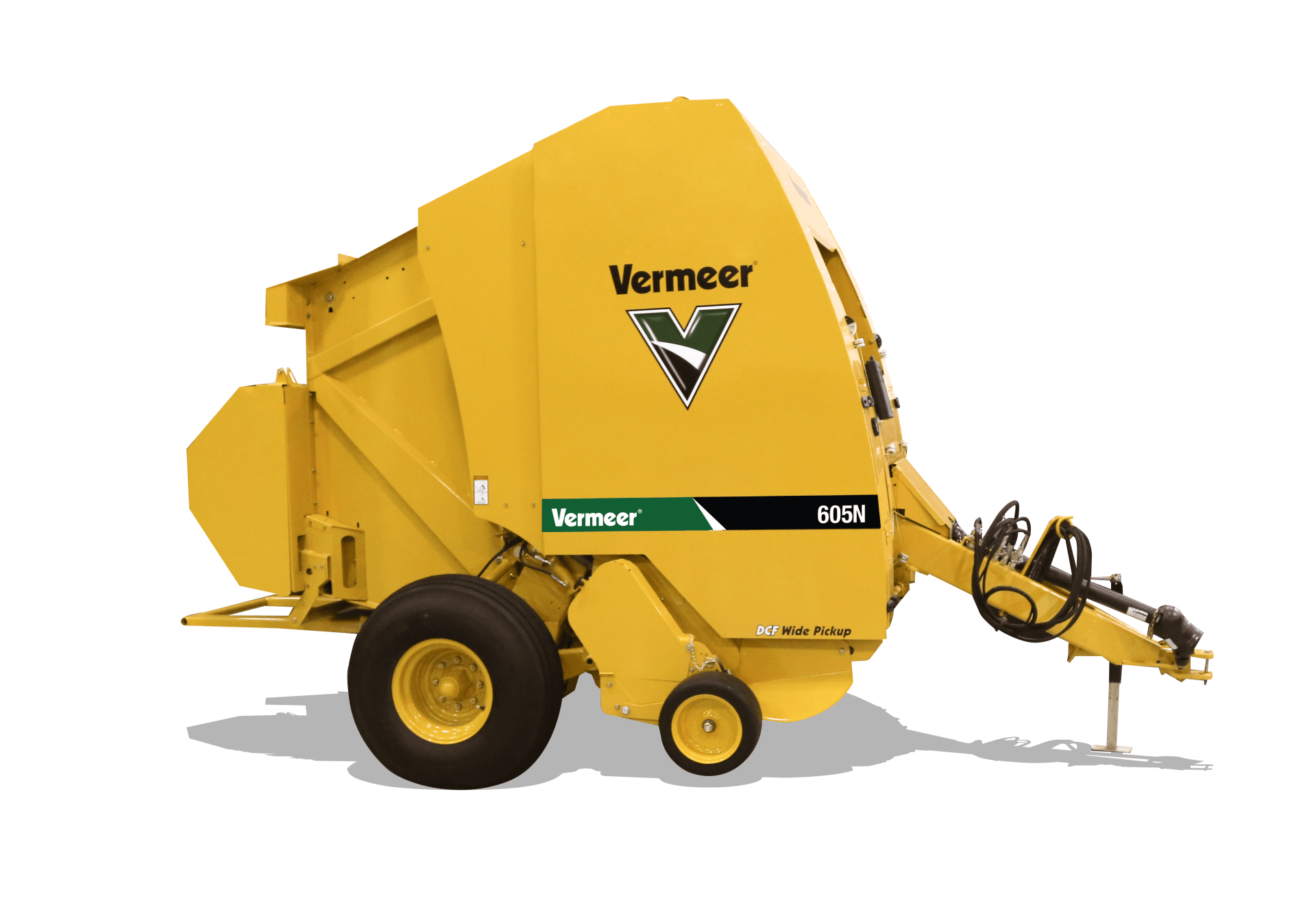 Yellow Vermeer round baler with black wheels, on a white background.