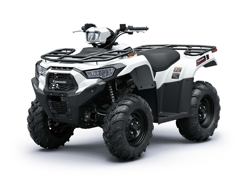 White and black Kawasaki ATV with black tires and front and rear cargo racks.