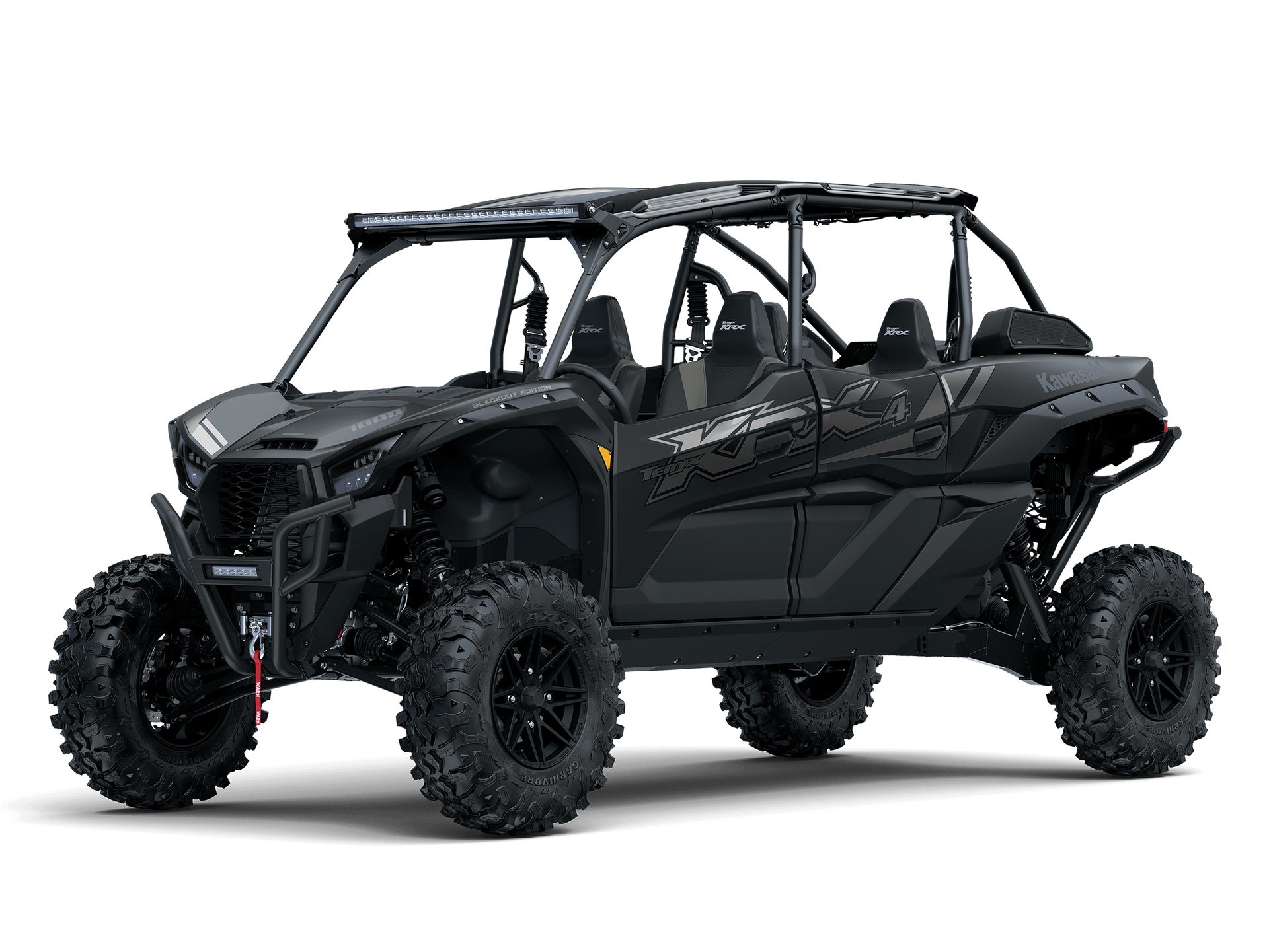 Black and green Kawasaki Teryx KRX 4 side-by-side UTV with large mud tires, on a white background.