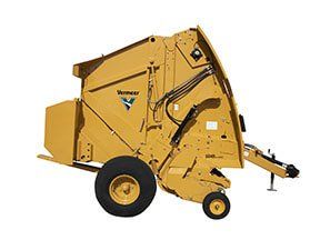 Yellow Vermeer round hay baler machine on a white background.