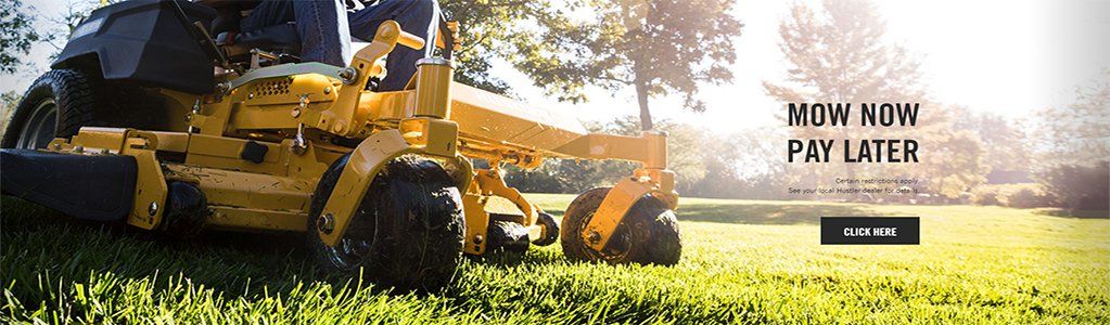 Yellow lawnmower mowing a green lawn. Text says Mow Now Pay Later.