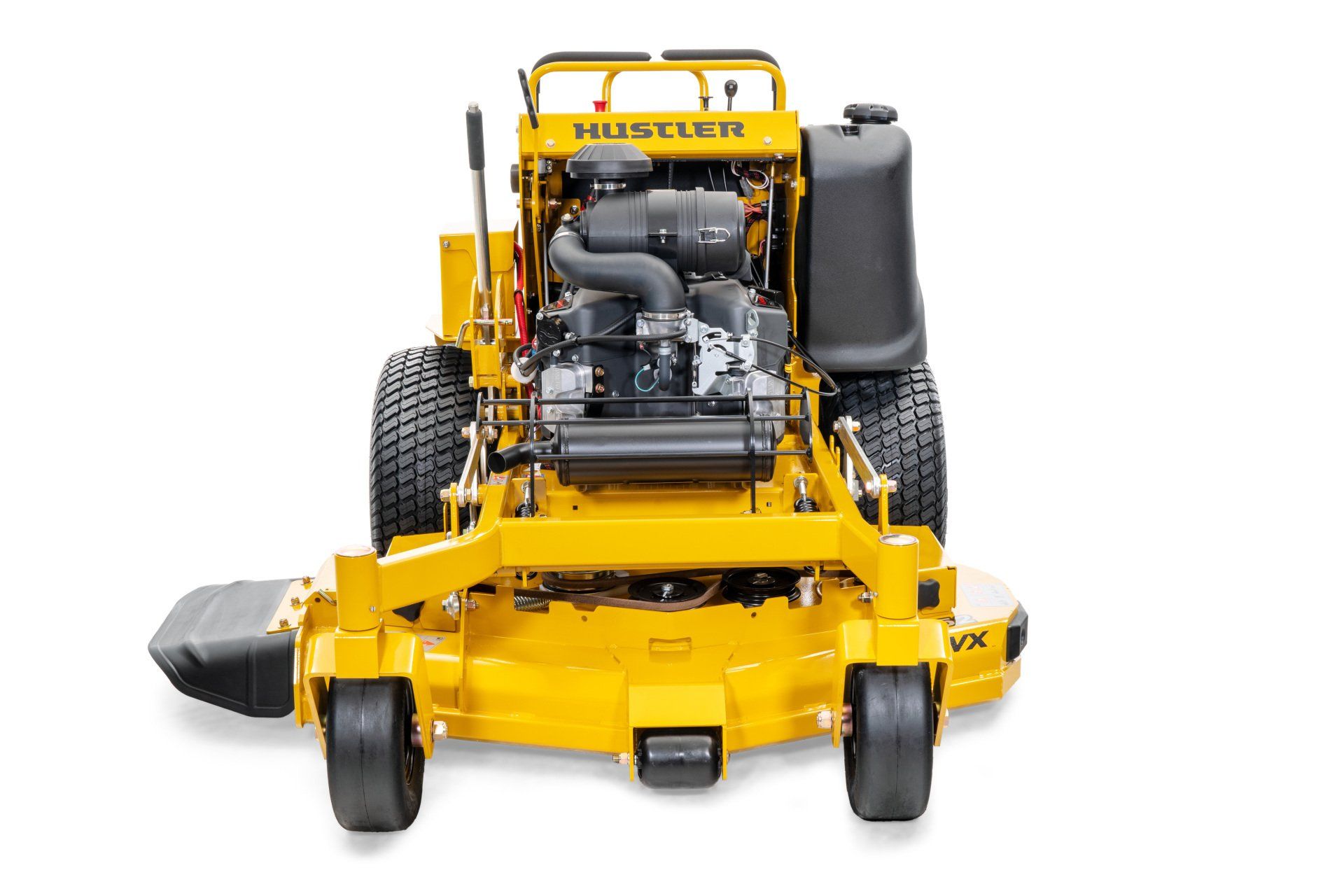 Yellow Hustler zero-turn lawn mower on a white background, front view, showing engine and deck.