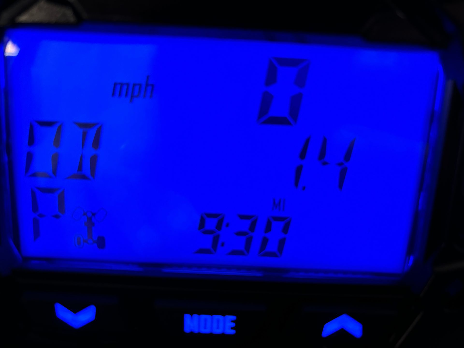 Blue digital display showing 0 mph, 14 mi, 9:30, and other metrics.