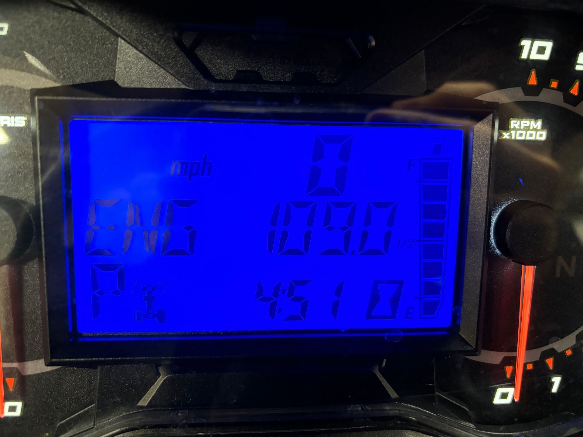 A digital dashboard displaying numbers: 0, 24.6, 109.0, and 451.0 on a blue screen.