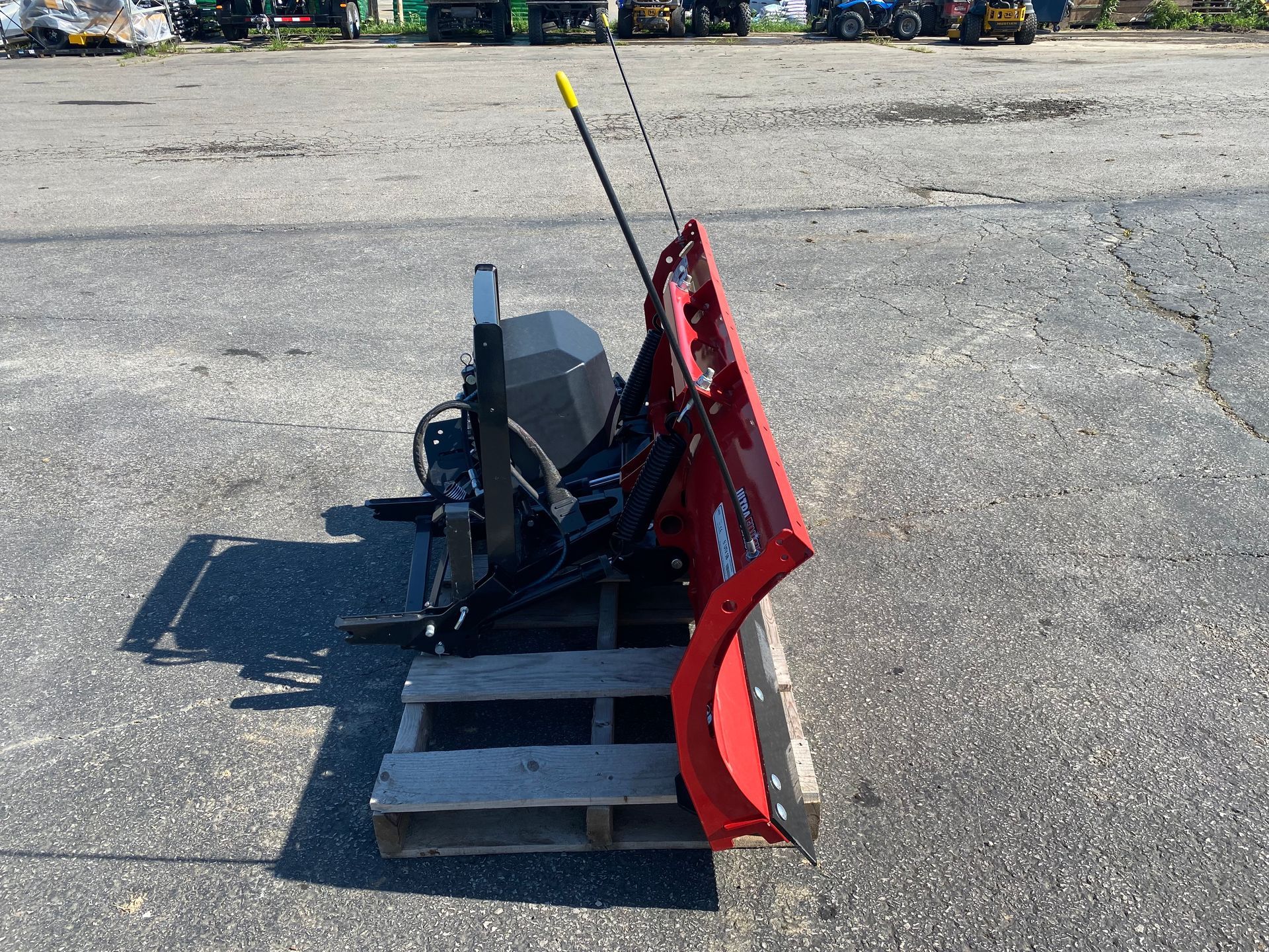 Red Western Impact blade on a pallet, outdoors, side view shot.