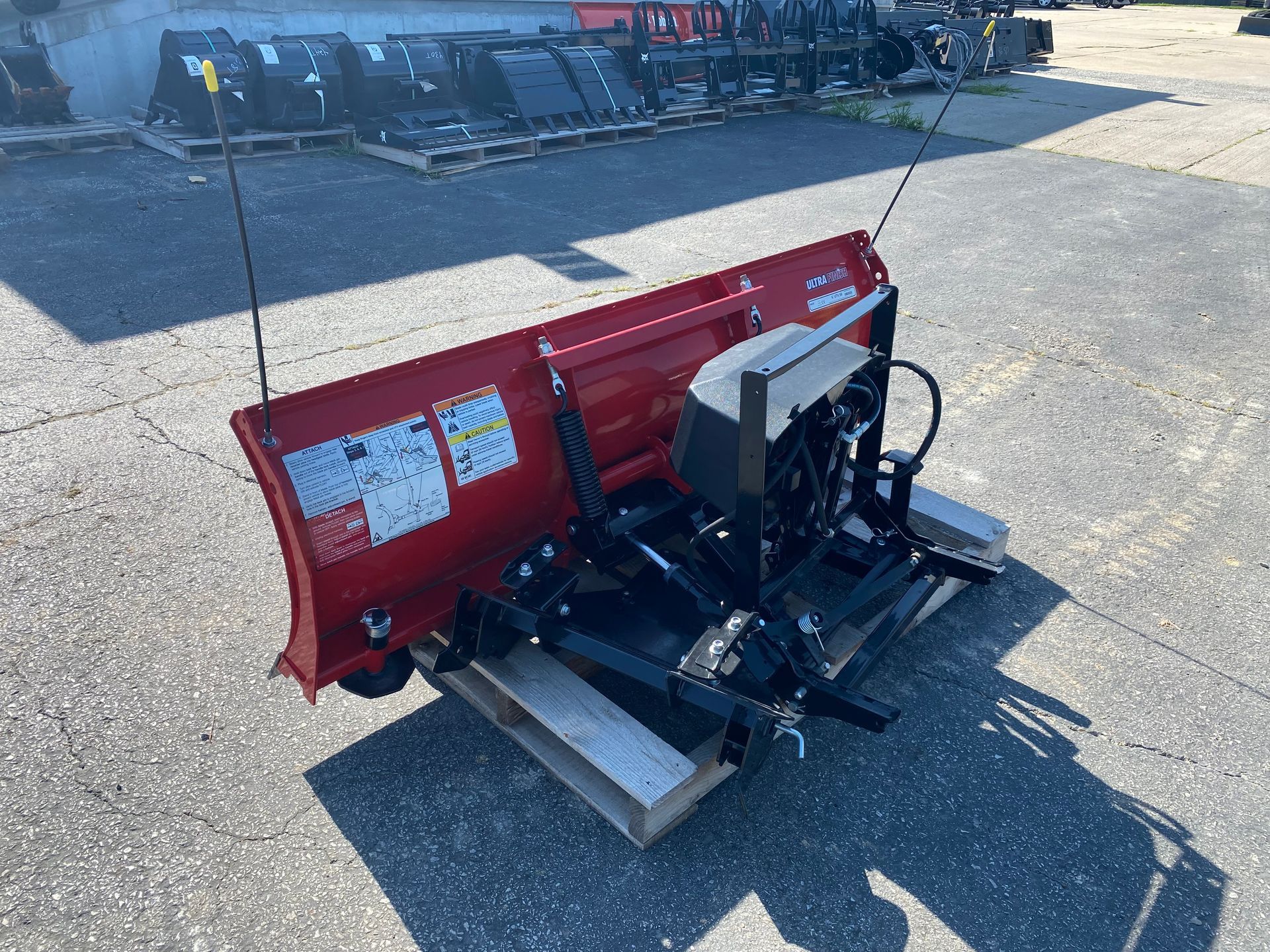 Red Western Impact blade on a pallet, outdoors, back angled shot.