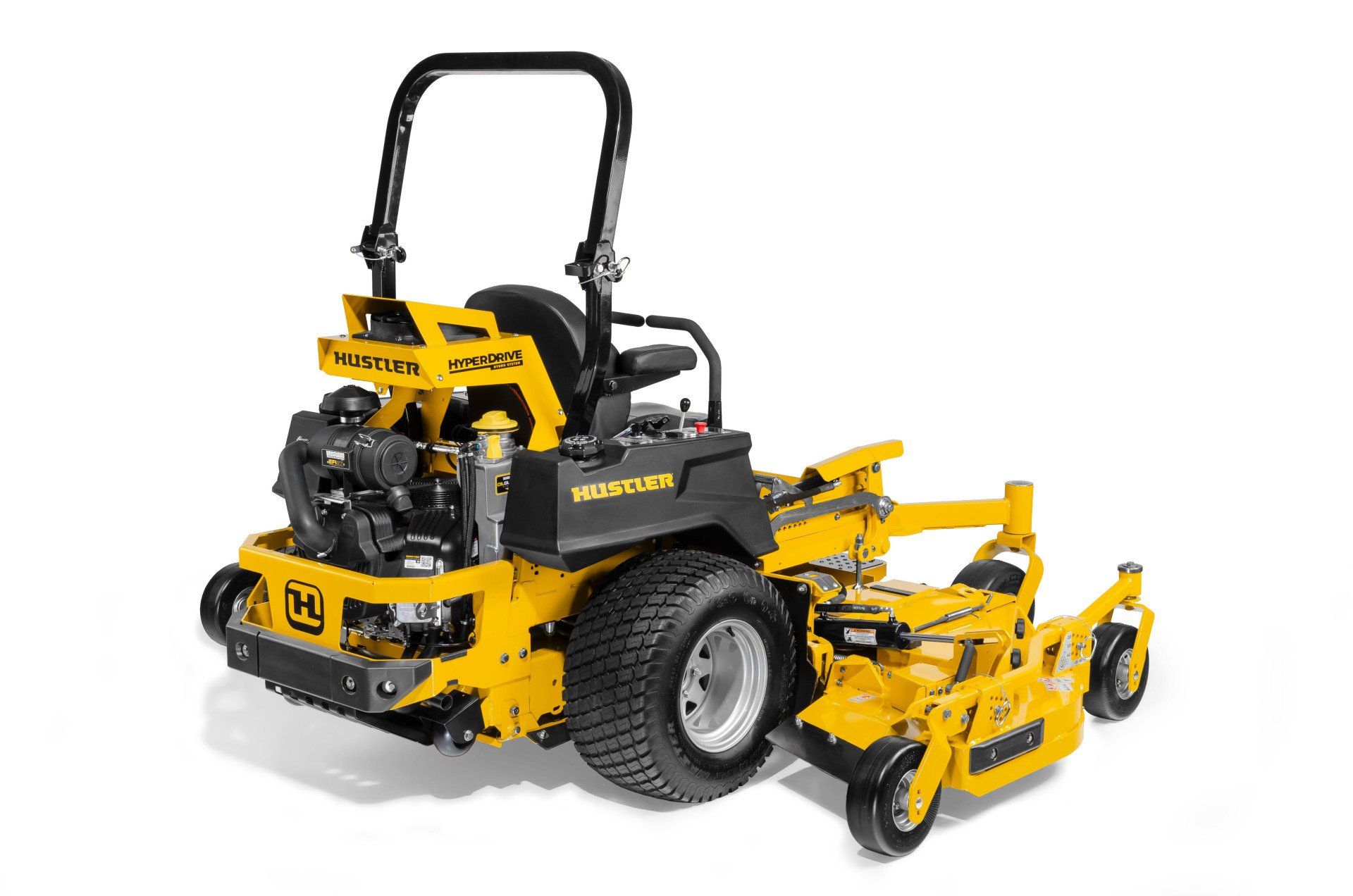 Yellow and black commercial zero-turn lawn mower on white background.