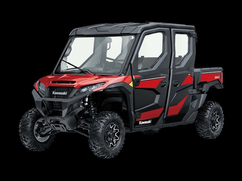 Kawasaki red and black UTV with a cab, black wheels, and a red front on a black background.