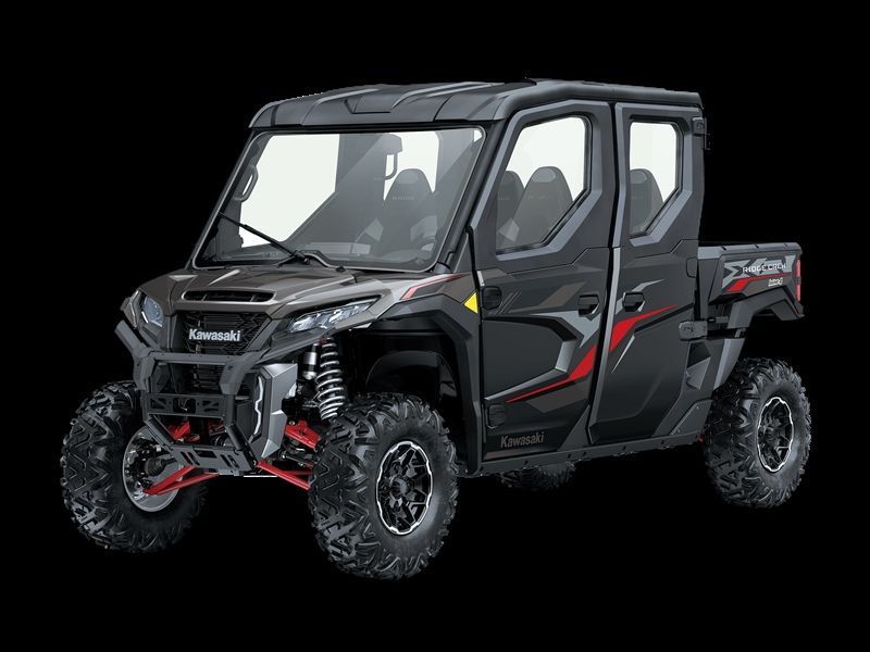 Black Kawasaki Mule SX four-door utility vehicle with red accents; on a black background.