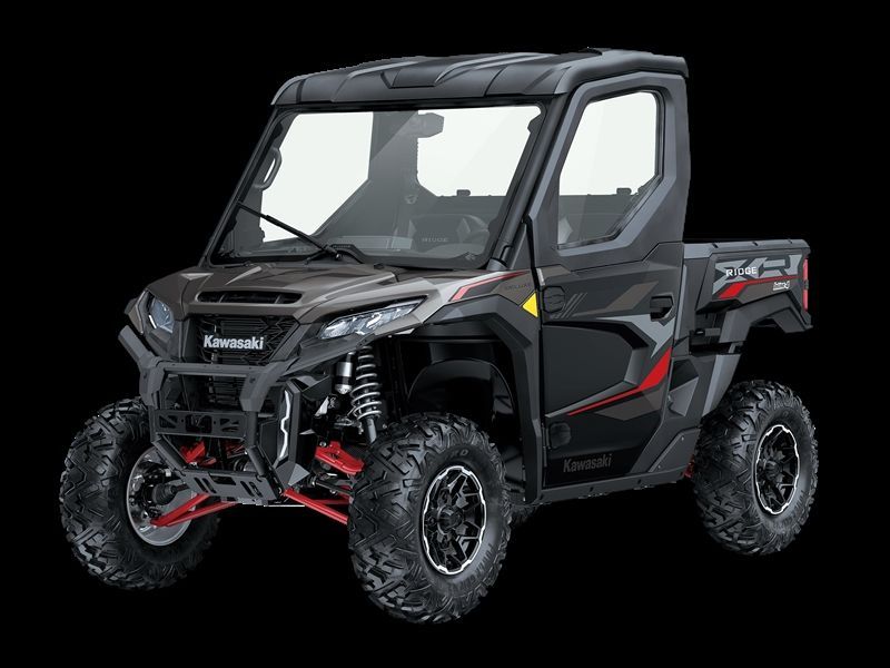 Black Kawasaki UTV with a cab, off-road tires, and red accents on a black background.