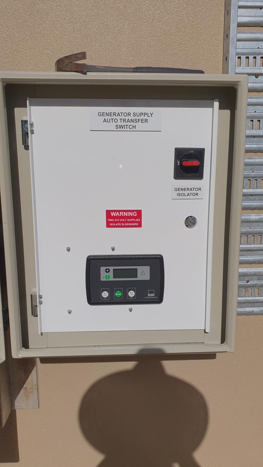 Blue Industrial Chiller Machine in a White Building — KAC Generation & Mechanical Pty Ltd In Bungalow, QLD