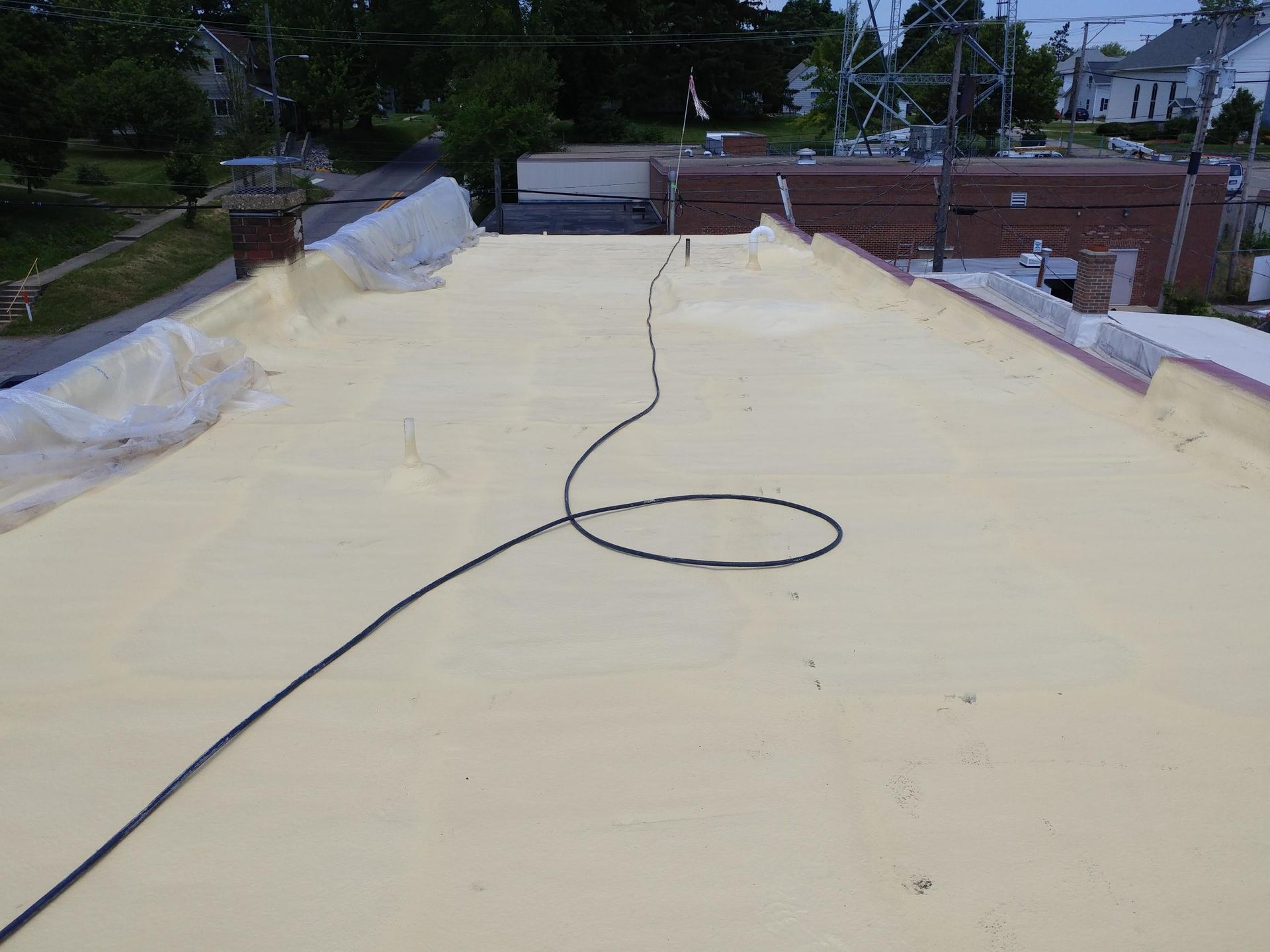 A roof with a hose attached to it