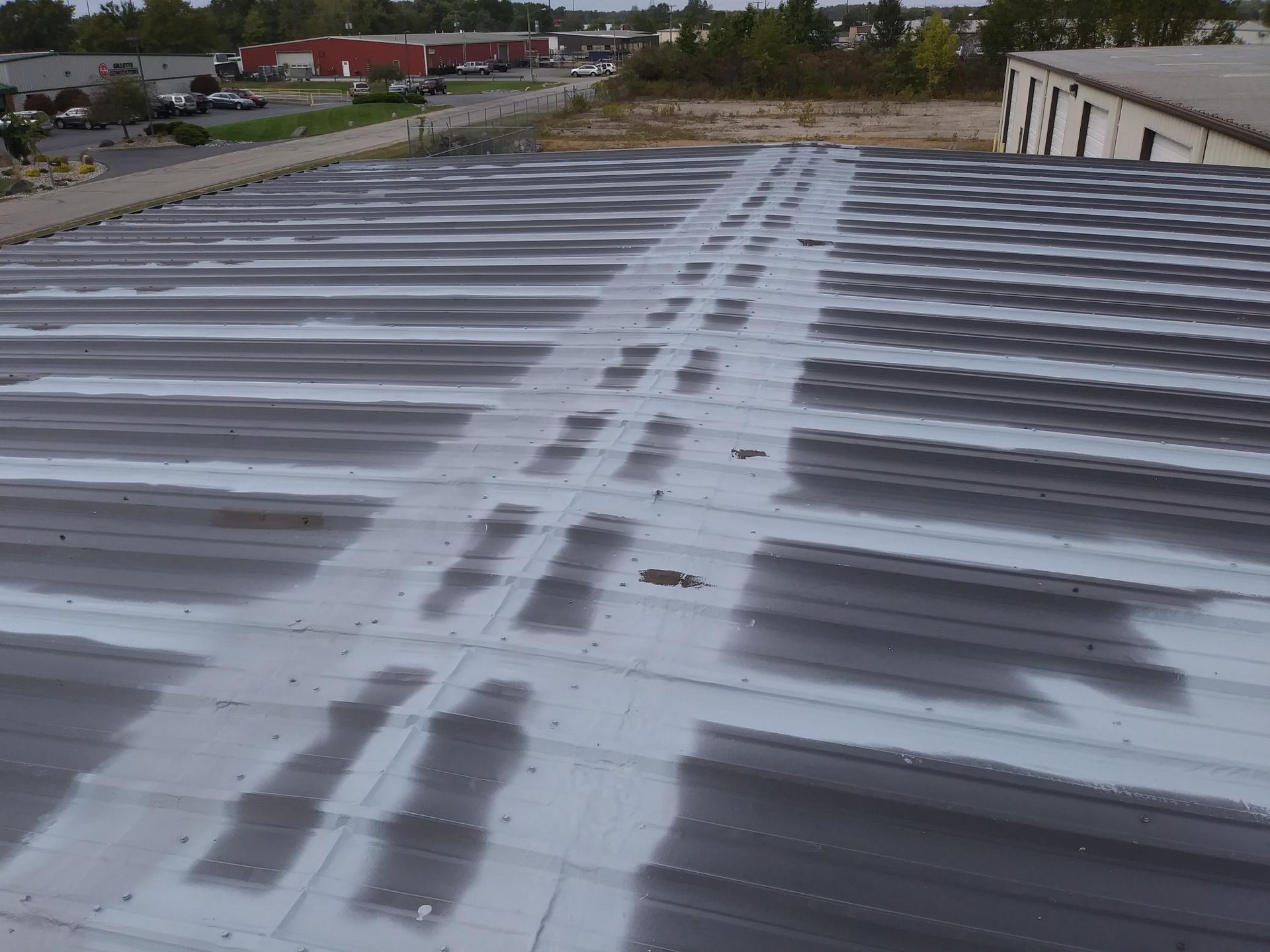 An aerial view of a roof with a lot of lines on it.