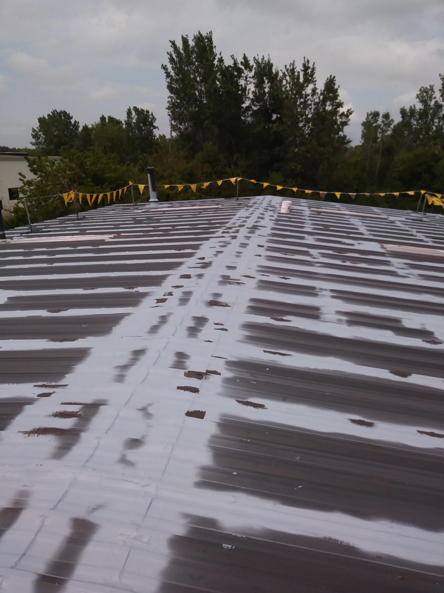 A roof with a lot of white paint on it