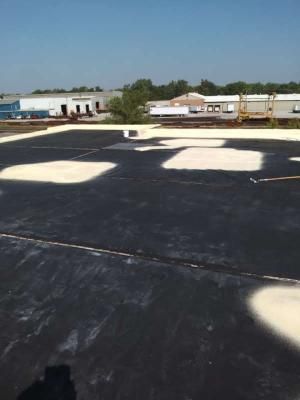 A black roof with white squares painted on it