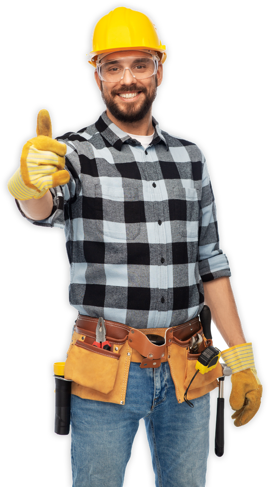 Construction worker in yellow hard hat and gloves, holding a tool and giving a thumbs-up.