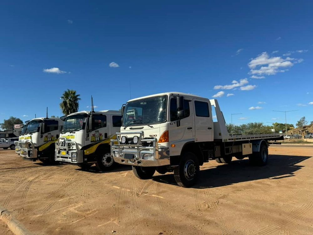 A Row Of Tow Trucks — AHT Towing in Ciccone, NT