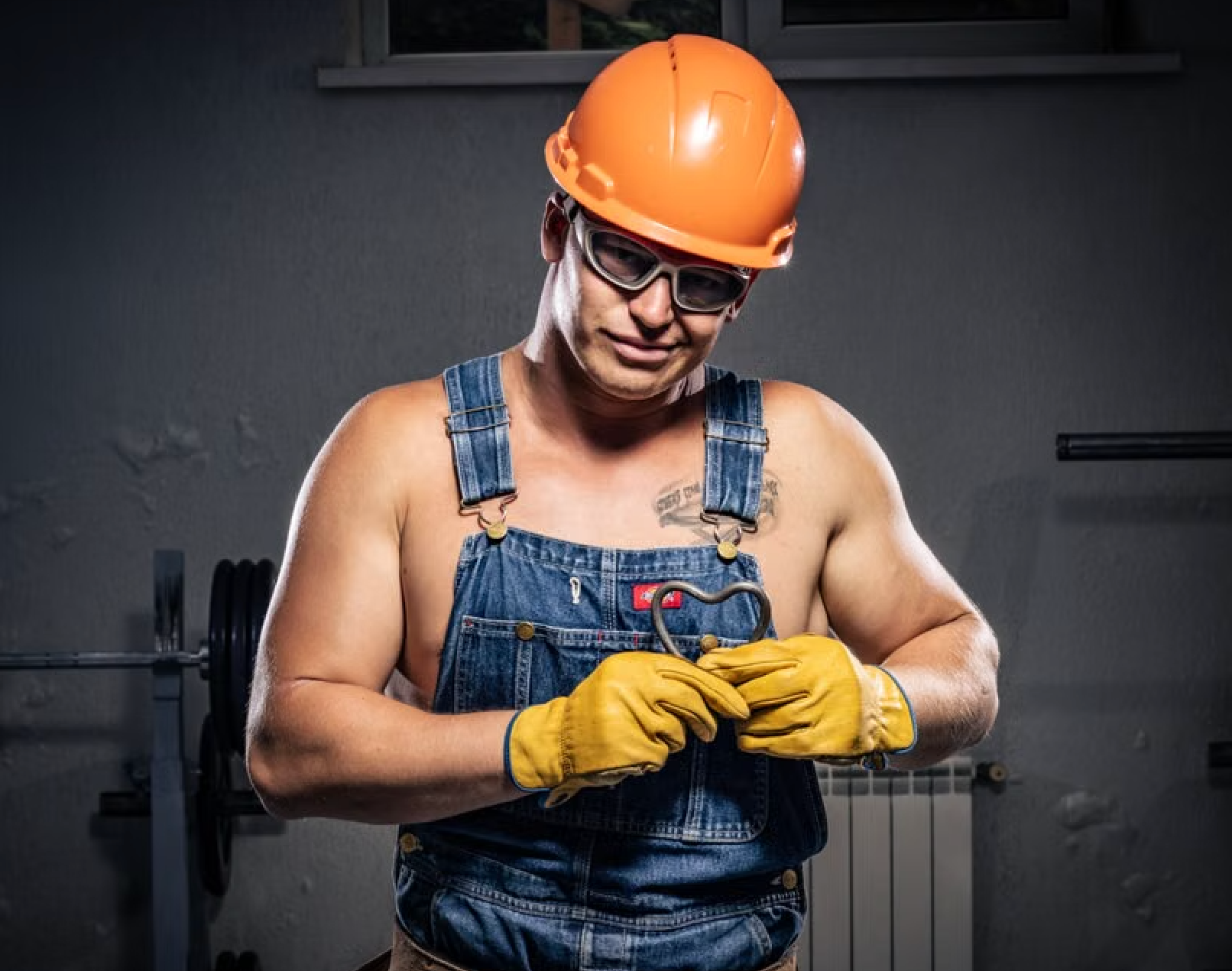 plumber unclogging drain