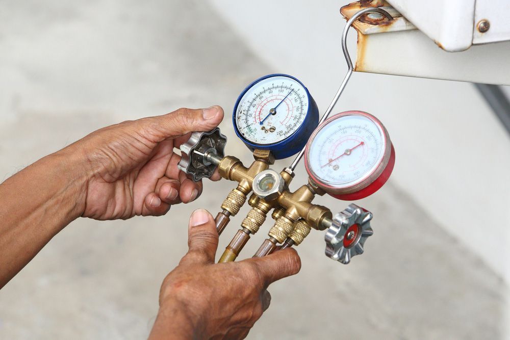Inspection of Refrigerant Pressure of Air Conditioner — Mazlin Electrical Services Pty Ltd in Kirwan, QLD