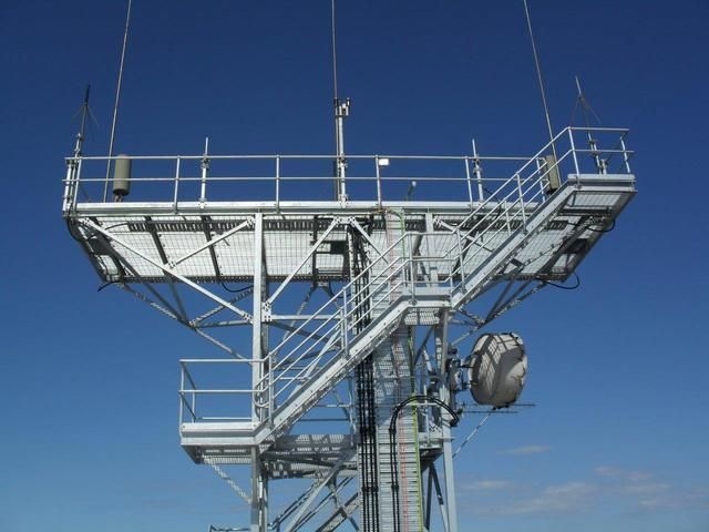 Large Metal Structure With Stairs and a Blue Sky in the Background — Sape Industries in Garbutt, QLD