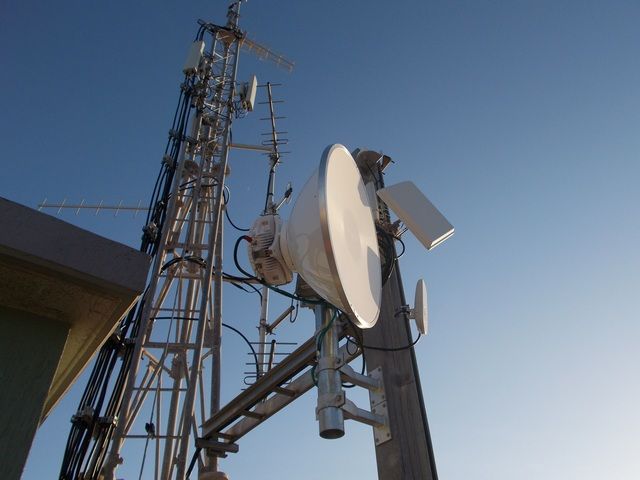 Tower With a Lot of Antennas Mounted on It — Sape Industries in Garbutt, QLD
