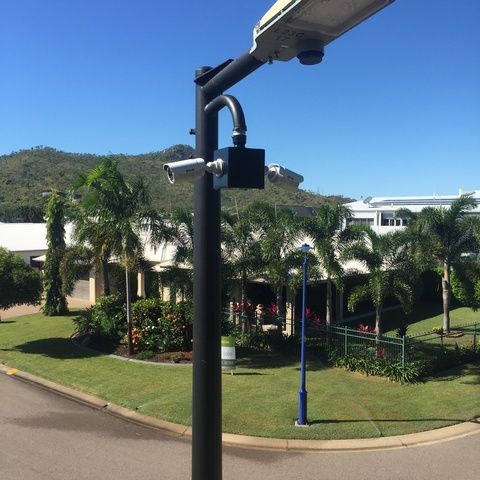 Street Light With a Camera Attached to It — Sape Industries in Garbutt, QLD