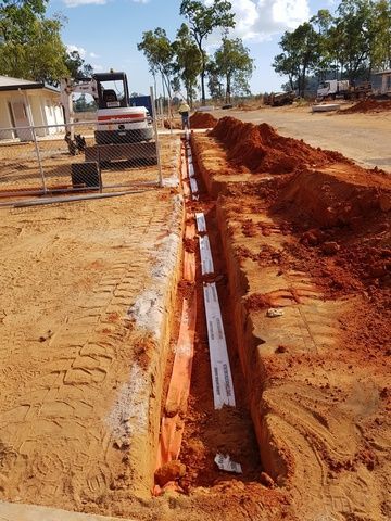 Bulldozer is Digging a Trench in the Dirt — Sape Industries in Garbutt, QLD