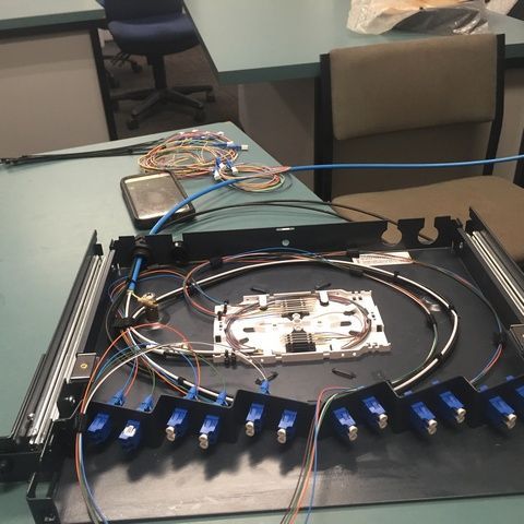 Bunch of Wires In Electronic Box Laying on a Table — Sape Industries in Garbutt, QLD