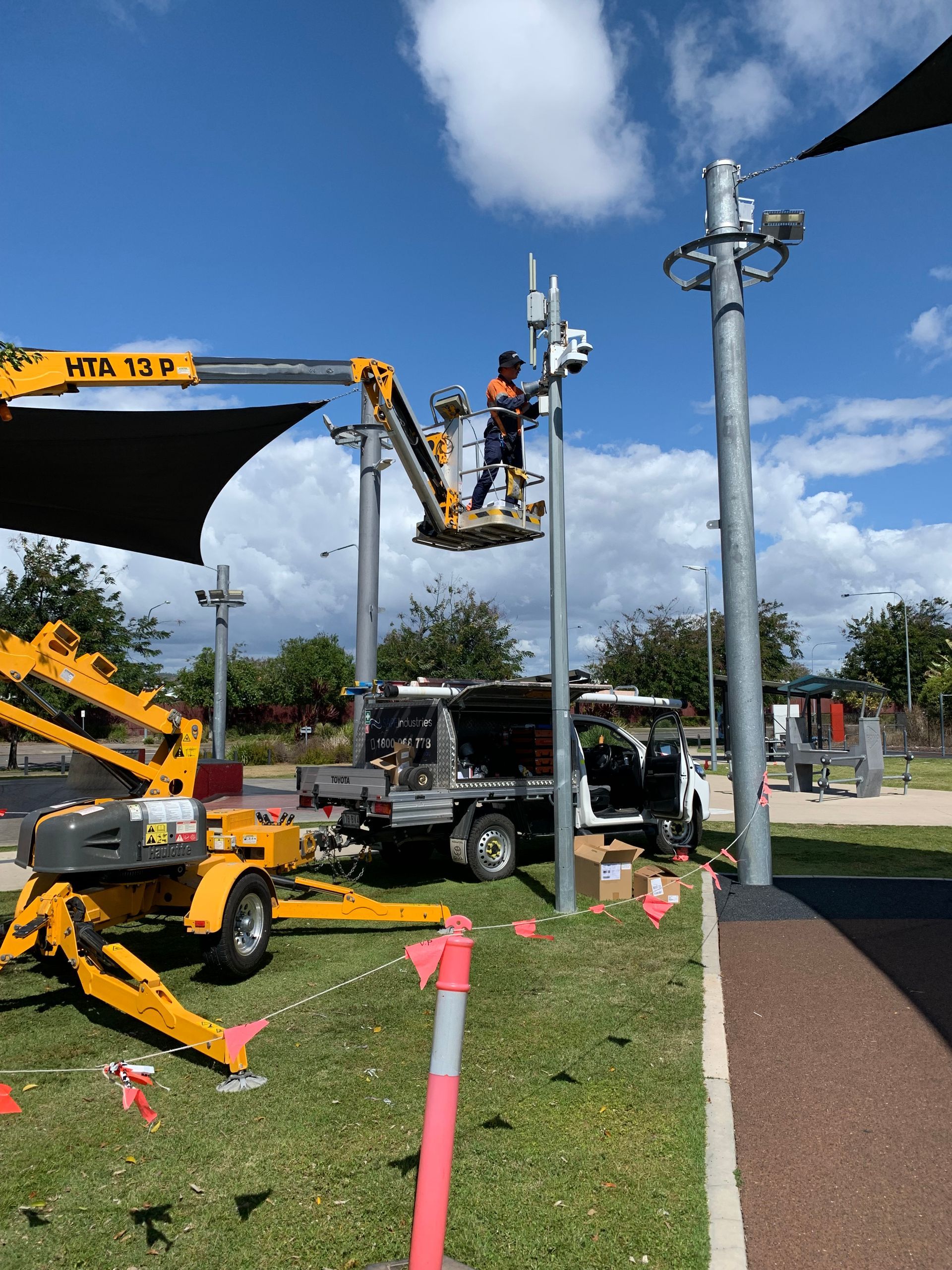 A man on a crane with the number 159 on it