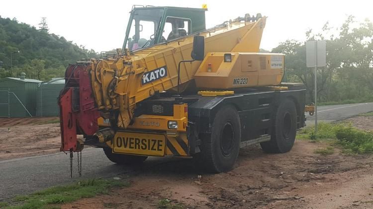 Yellow Oversize Crane is Parked on the Side of the Road — Sape Industries in Garbutt, QLD