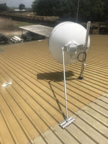 Satellite Dish is Mounted on Top of a Metal Roof — Sape Industries in Garbutt, QLD