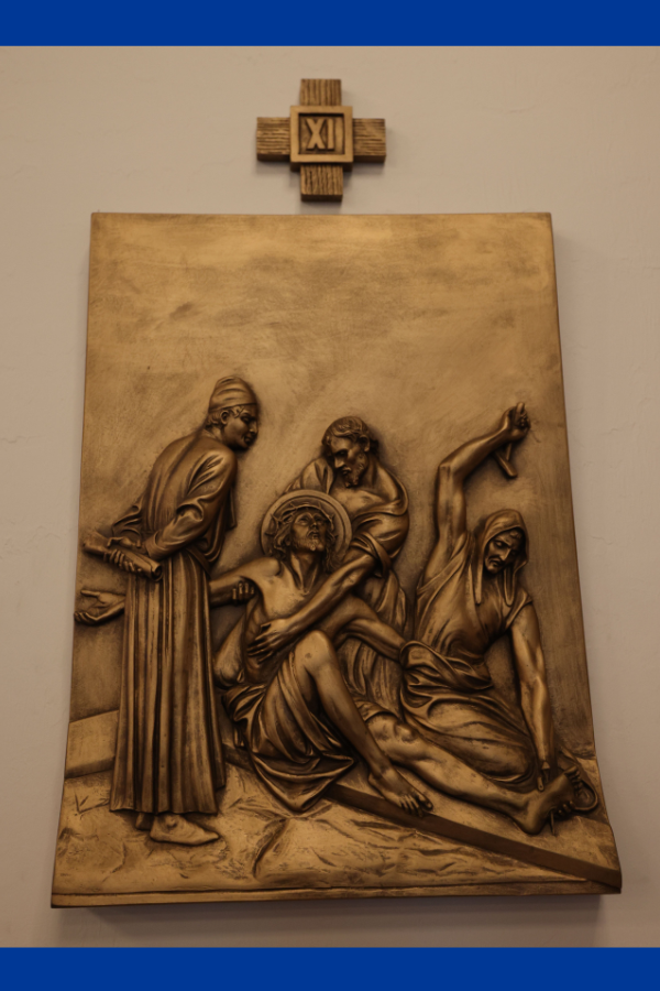 Roman soldiers nail Jesus’ hands and feet to the cross at Calvary.