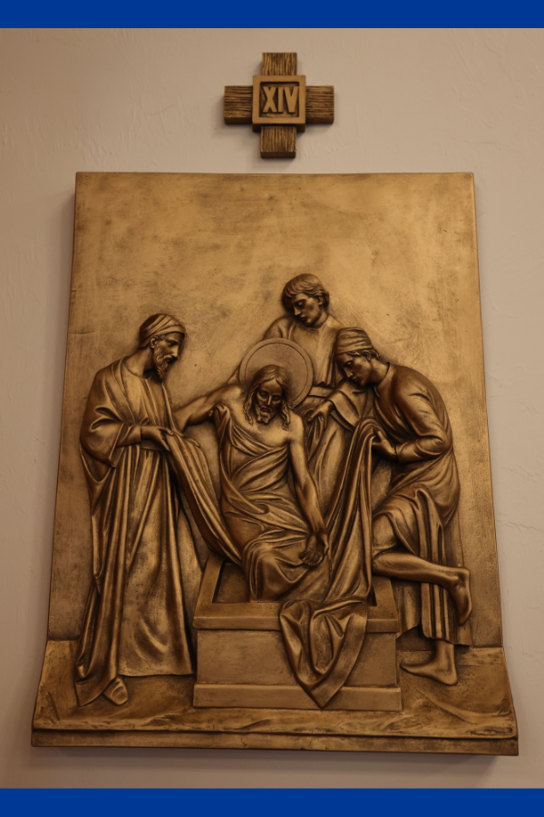 Jesus’ body is wrapped and placed in the tomb, awaiting the Resurrection.
