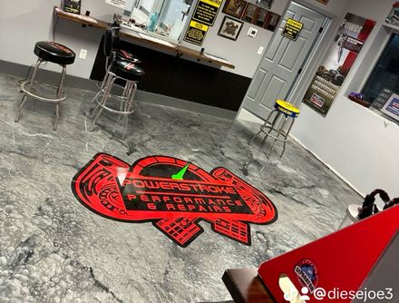 Powerstroke Performance & Repairs logo on floor | Powerstroke Performance & Repairs