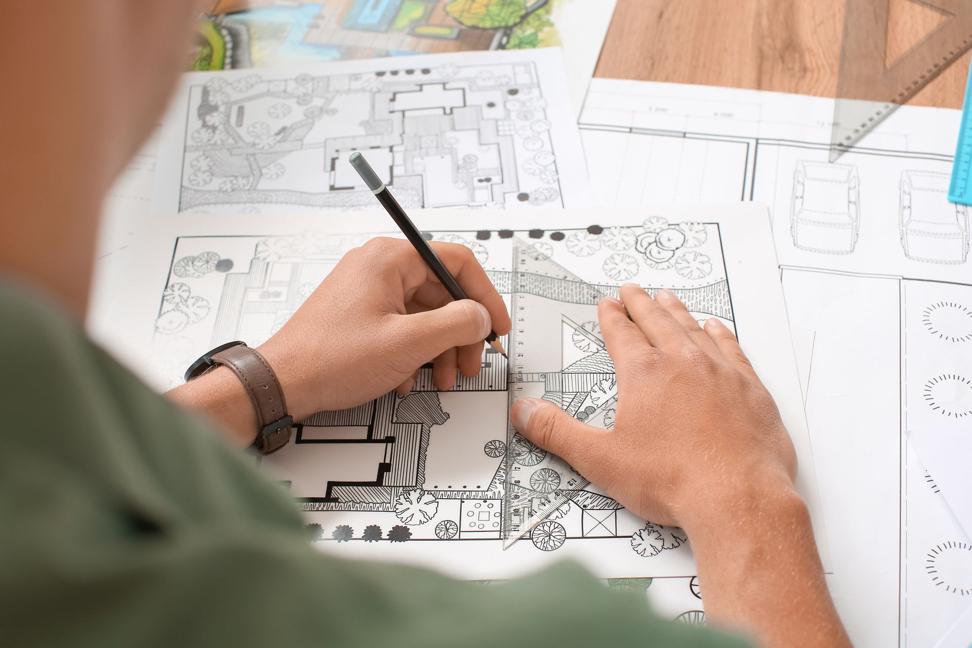 A landscape architect is working on a design.