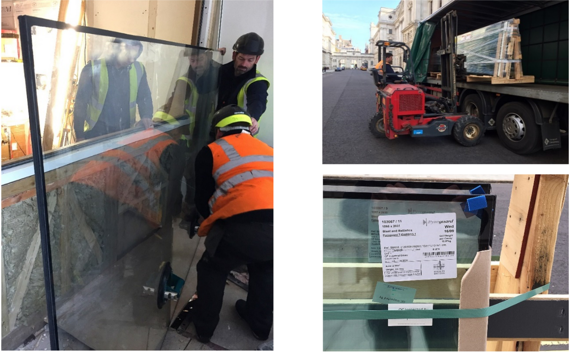Workers in safety vests use suction tools to install a large glass panel, while a forklift unloads another from a truck.