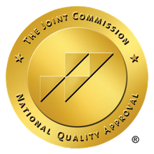 Gold seal: The Joint Commission National Quality Approval logo.