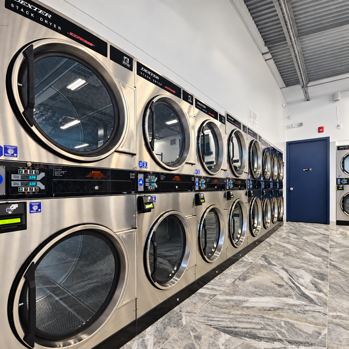 Inside Union Laundry: a row of commercial dryers.