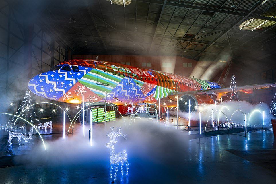 World's First Christmas Light Show On a Plane: London Luton Airport World's First Christmas Light Show On a Plane: London Luton Airport
