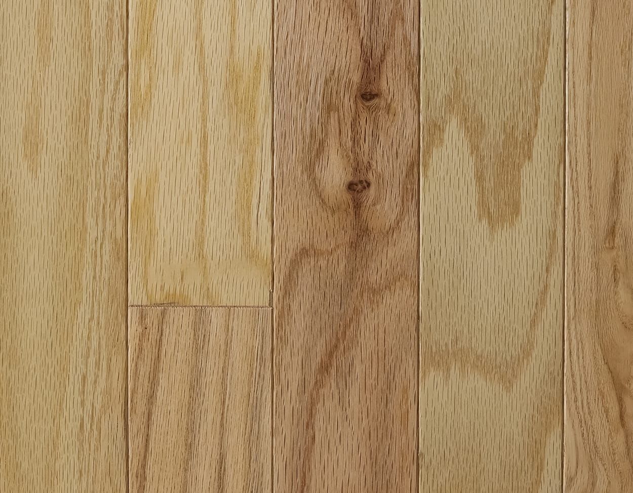 A close up of a wooden floor with a grain and texture.