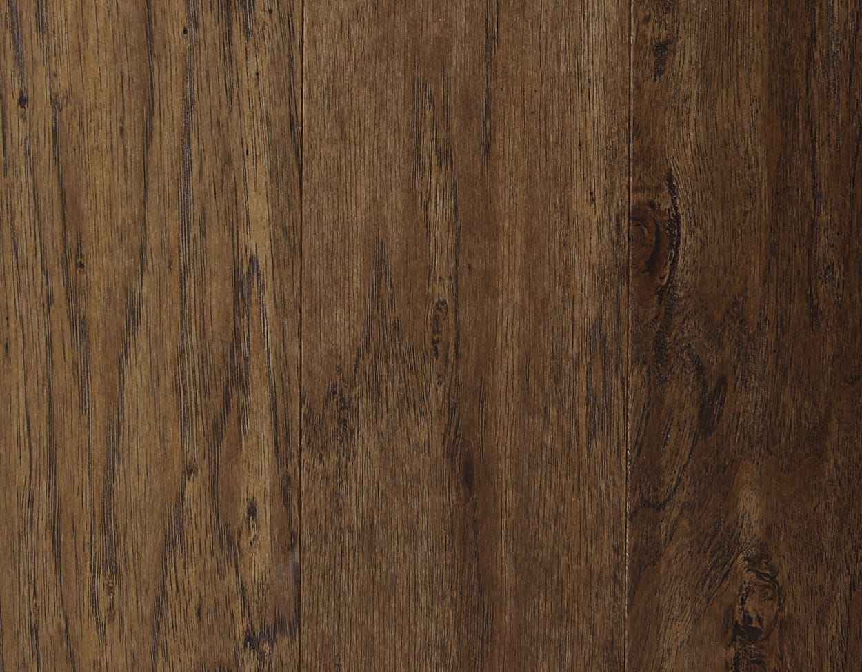 A close up of a piece of wood showing the texture of the wood.