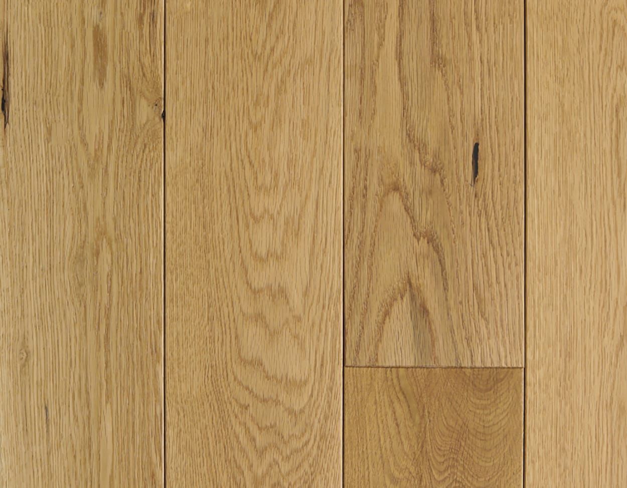 A close up of a wooden floor with a grain and texture.