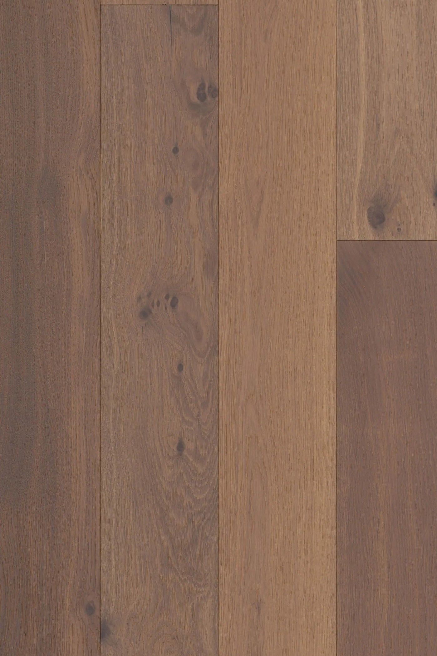 A close up of a wooden floor with a grain and texture.