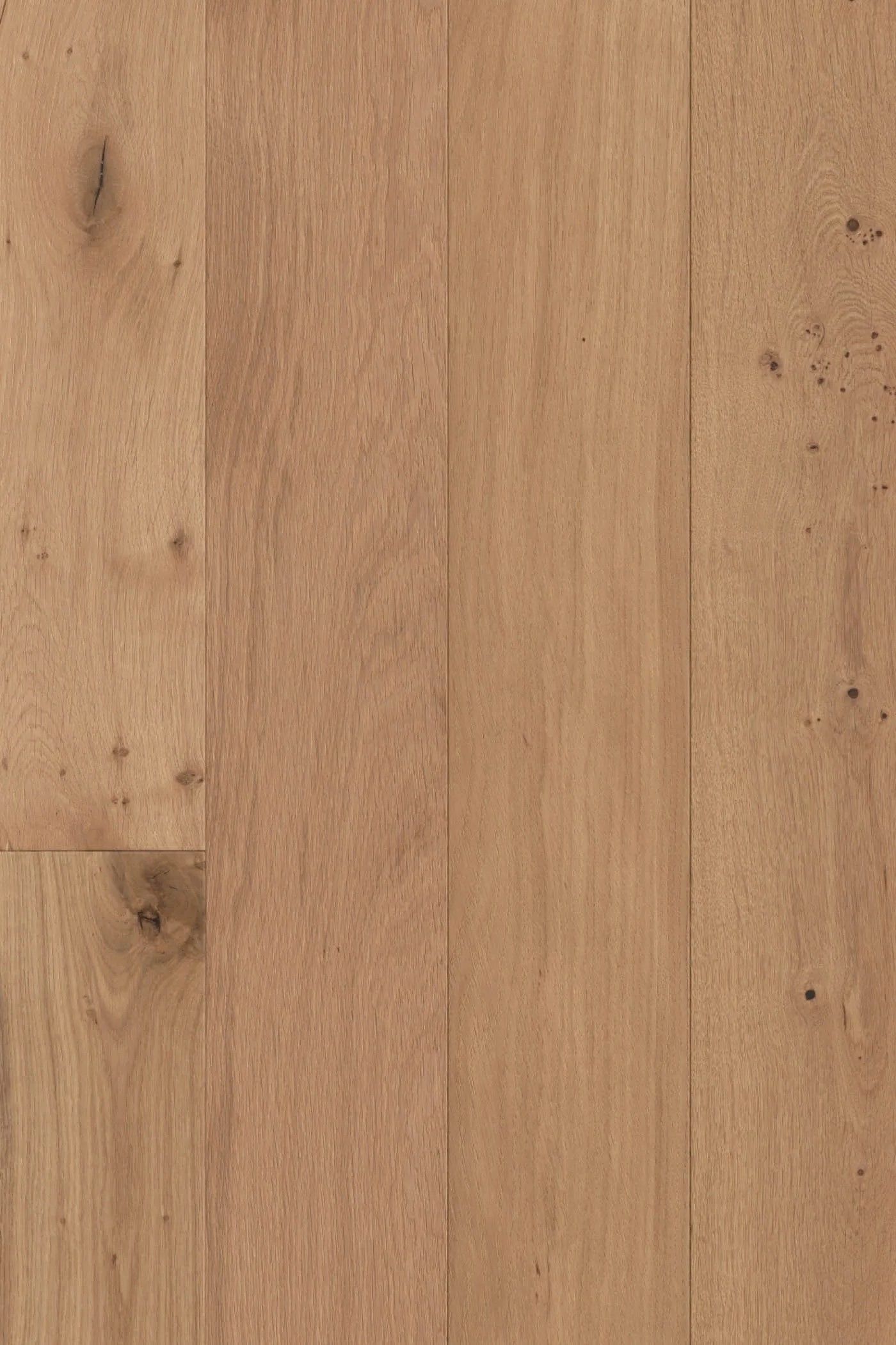 A close up of a wooden floor with a grain and texture.