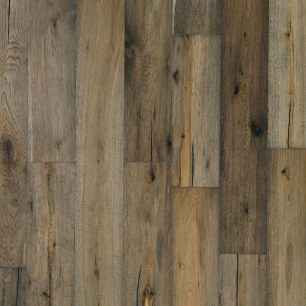 A close up of a wooden floor with a lot of grain.