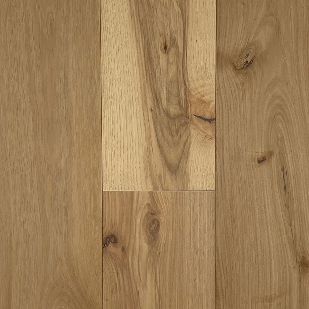 A close up of a wooden floor with a grain and texture.