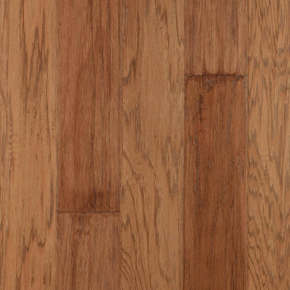 A close up of a piece of hardwood flooring.
