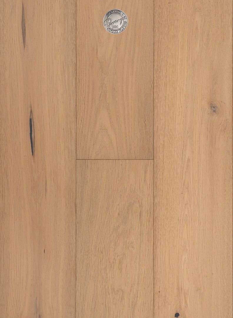 A close up of a wooden floor with a diamond in the middle.