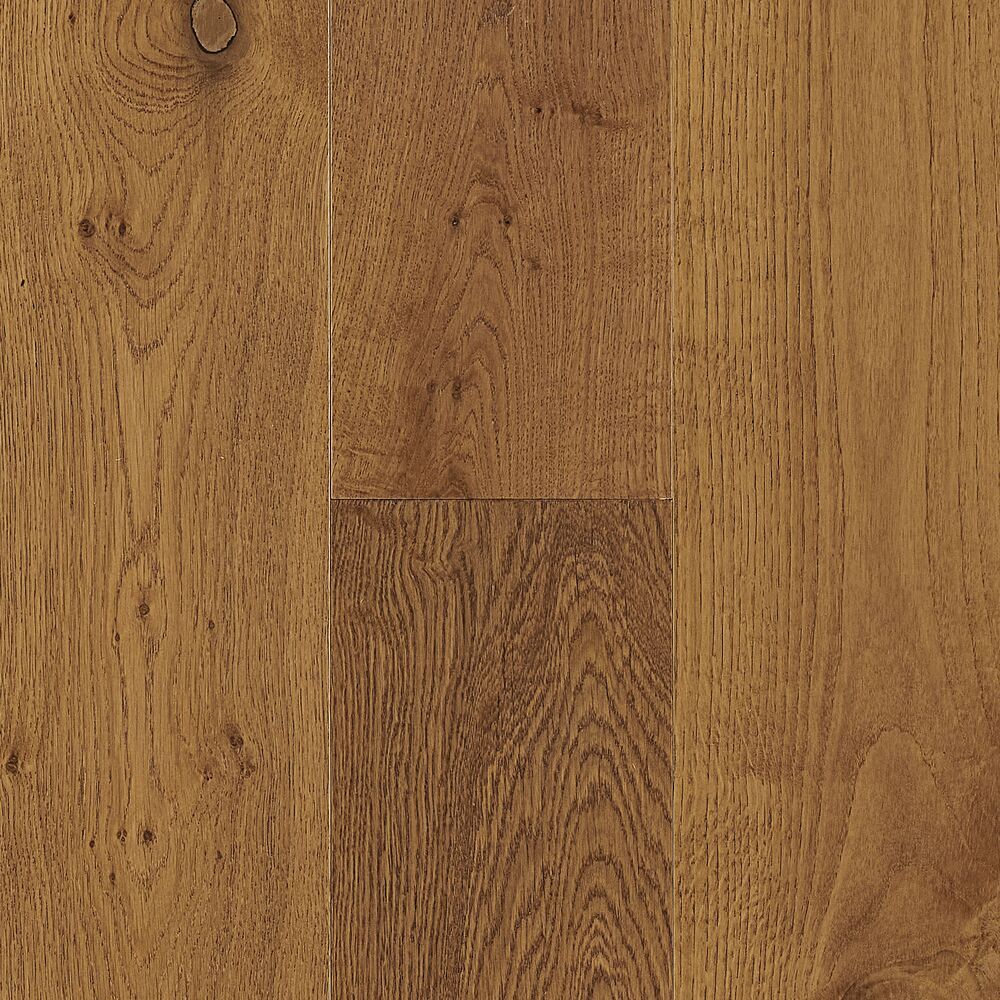A close up of a wooden floor with a grain and texture.